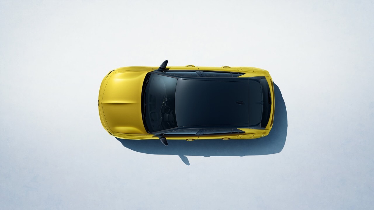 Bovenaanzicht van een gele Opel Astra Hatchback